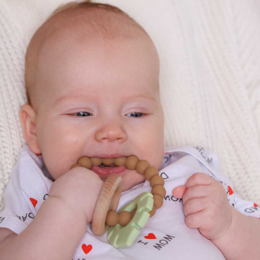 Силиконовая игрушка-прорезыватель с буком Natura (зеленый), арт. 0420/02 зеленый, производитель Uviton, ISBN 465-7-78025-188-5, № 6