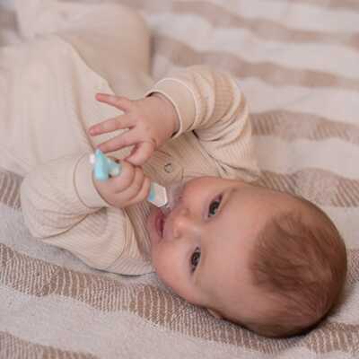 Прорезыватель-массажер Uviton для десен голубой, производитель Uviton, ISBN 465-7-78025-067-3№ 6